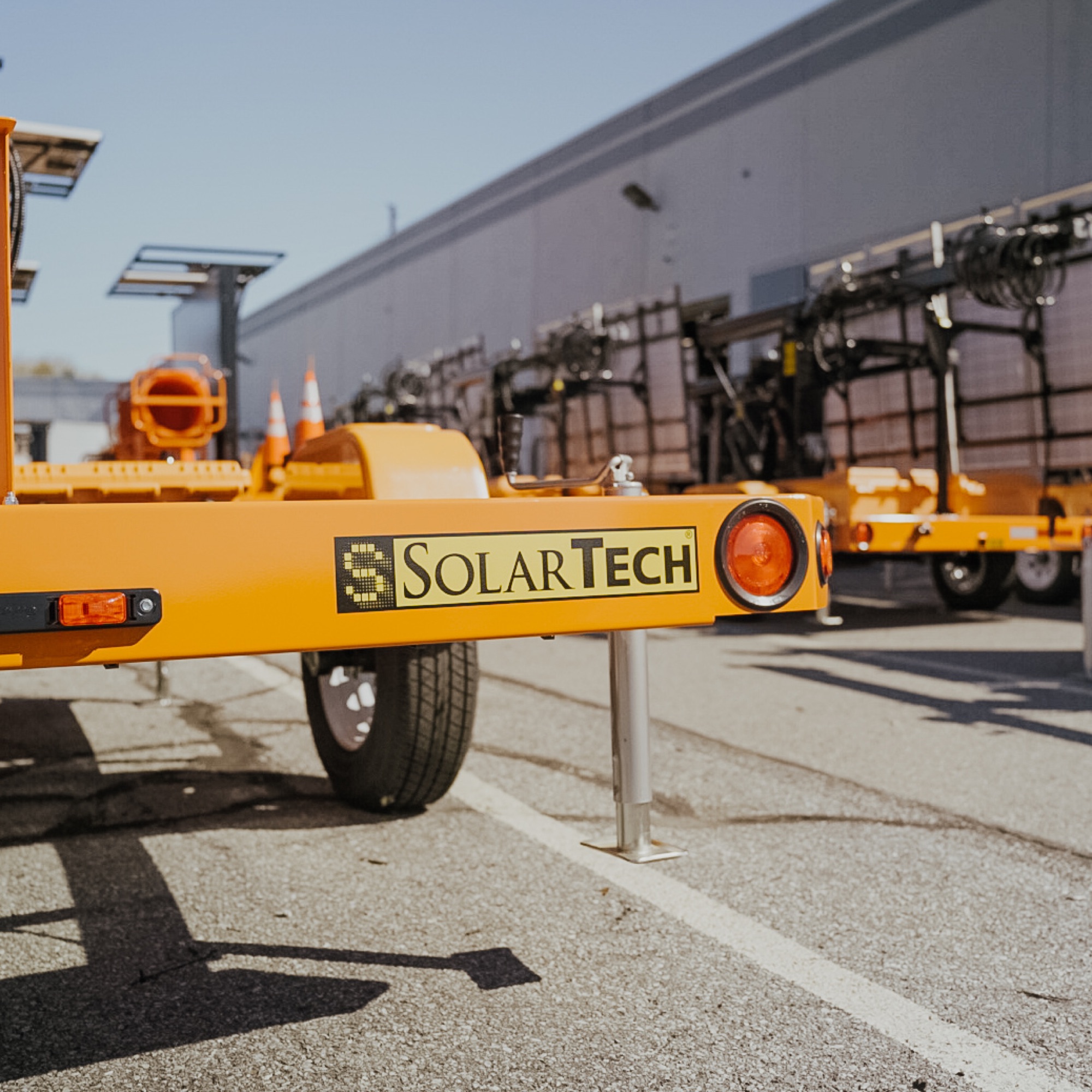 The front of a SolarTech trailer, with more trailers lined up behind it